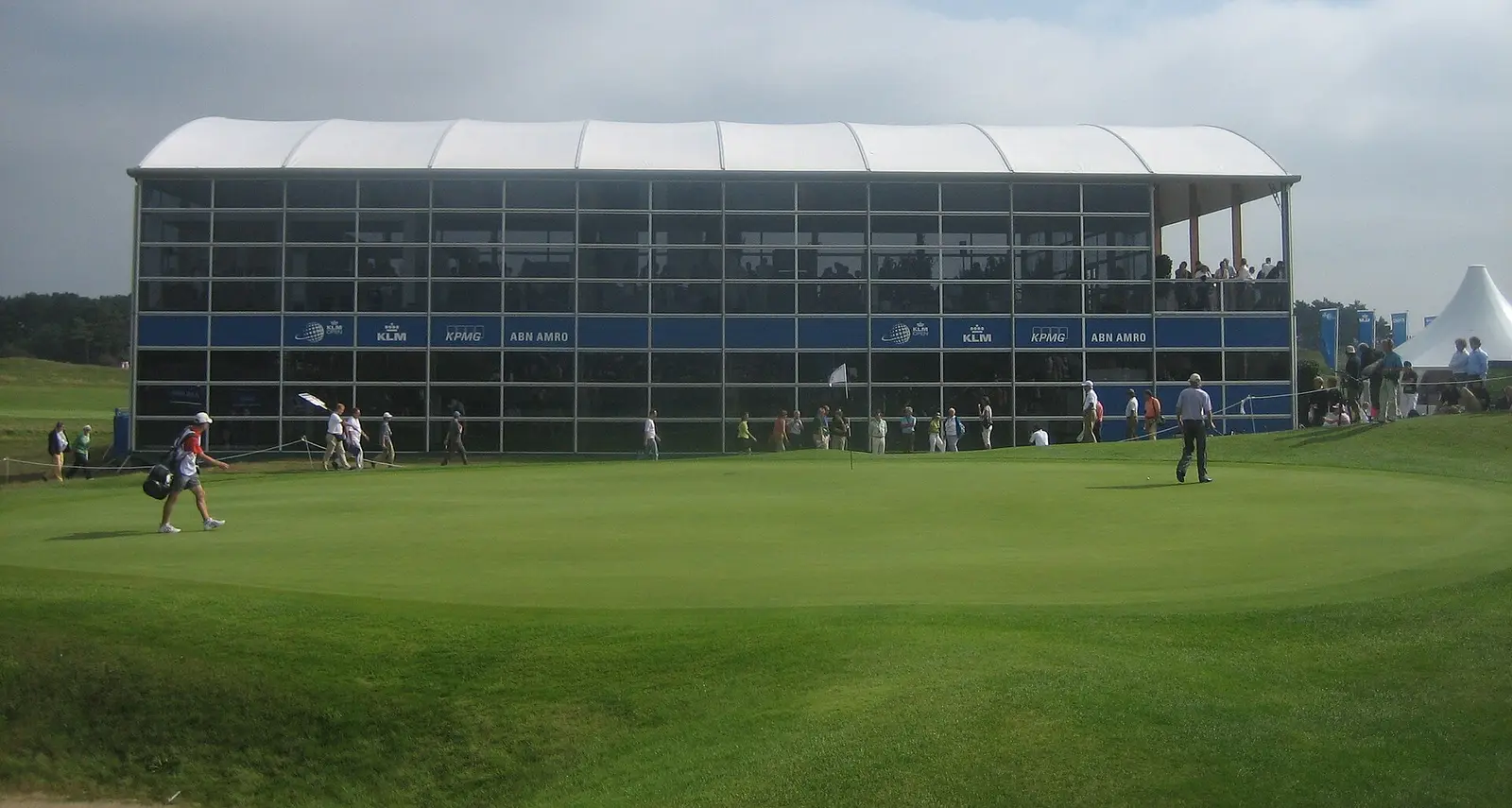 The 14th green and grandstand at the KLM Open at Kennemer Golf and Country Club